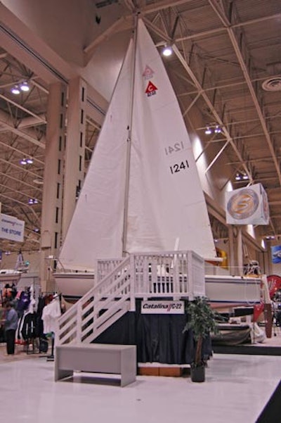 Temporary platforms surround each boat, enabling attendees to board.