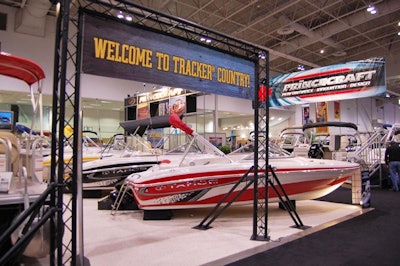 Product categories on display include docks, engines, sailboats, canoes, kayaks, power boats, jet boats, and fishing and pontoon boats.