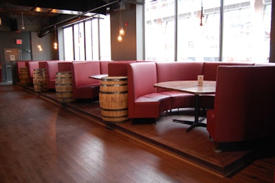 Barrels from Wiser's Distillery double as side tables in the dining room.