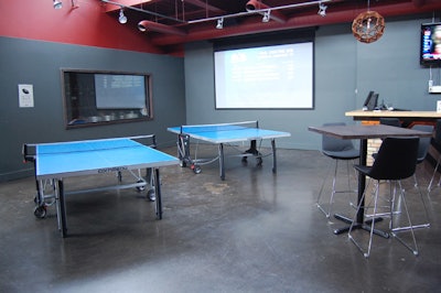 Guests can play ping-pong, arcade games, and shuffleboard on the second floor.