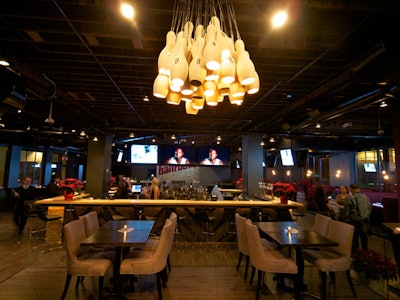 Design features include lighting fixtures made of bowling pins.