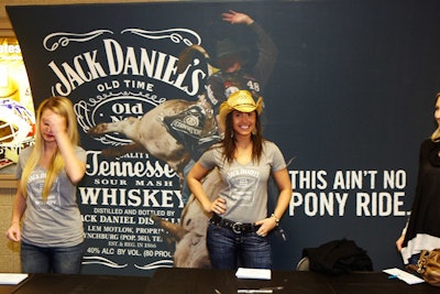 Jack Daniel's, the tournament's official liquor sponsor, was one of a dozen or so sponsors that set up tables in the concourse to generate brand awareness.
