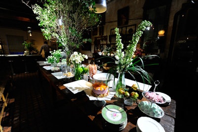 The culinary centerpiece was the grand dessert table, inspired by Sofia Coppola's Marie Antoinette and awash in a palette of pink, lilac, pale yellow and white. Vintage serving pieces were juxtaposed against the rustic farmhouse kitchen.