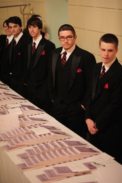 The Northport High School greeter guys were very Ivy League-looking. This picture doesn't show that there were a dozen or so of them on each side of the room, which amplified the effect.