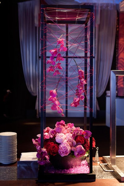 Sculptural floral arrangements surrounded guests at the opening reception.
