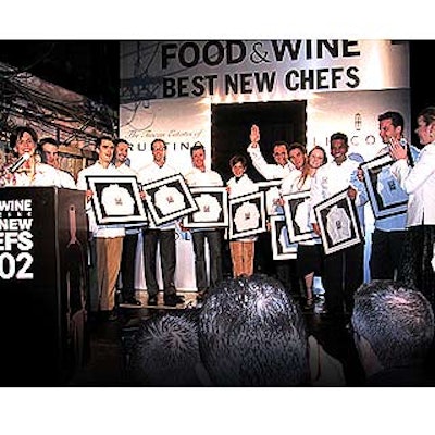 At Food & Wine's Best New Chefs 2002 party, editor in chief Dana Cowin (far left) announced the magazine's picks for the best new chefs in America. Publisher Julie McGowan (far right) handed out framed mini chef uniforms to each chef.