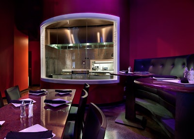 Guests seated near the glass-enclosed tandoor room can watch as chefs prepare food in the clay ovens.