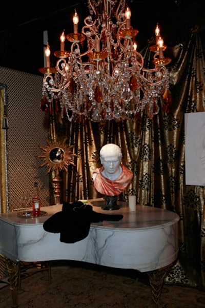 Bruce Sutka of Sutka Productions designed the Mademoiselle Room, inspired by Federico Fellini's 1960 film La Dolce Vita, set in Rome. He used Venetian masks, plexi candelabra, a silver faux-wood console, and various Tony Duquette collection pieces.