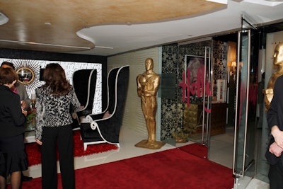 The reception lobby was designed by Alex Matamoros of DCOTA Design Services. 'The lobby is the first area everyone sees, so I selected a theme that would represent all of the movies represented at DesignHouse,' he says. 'My inspiration was the extravaganza of the Oscars.'