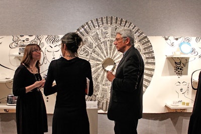 Many of the auction items were incorporated into the display, including objects like a Mexican circle skirt (pictured) and colorful handkerchiefs.