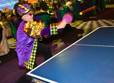 Guests tried their hands at ping-pong between dinner courses in the main party space.