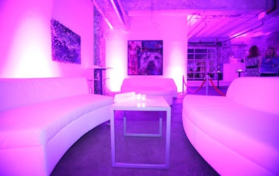 AFR Event Furnishings provided white leather sofas in the main event space for the premier-level sponsors.