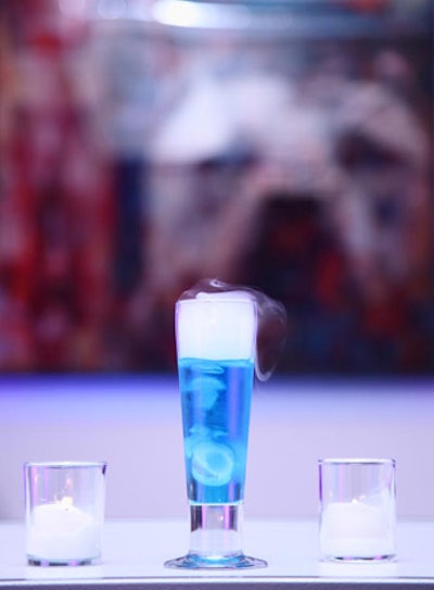 Clark Construction Group sponsored the Blue Bulldozer, one of the night's three signature cocktails, with blue Curacao, vodka, peach schnapps, and a dry-ice cube for a smoky effect.