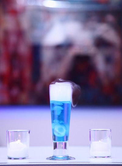 Clark Construction Group sponsored the Blue Bulldozer, one of the night's three signature cocktails, with blue Curacao, vodka, peach schnapps, and a dry-ice cube for a smoky effect.