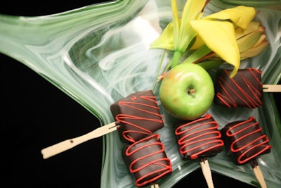 Federal City Caterers served cookies on a stick covered in chocolate for dessert.