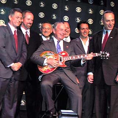 Mayor Michael Bloomberg posed with a guitar at the Grammy awards press conference at Madison Square Garden.