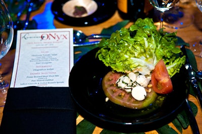 Dinner began with an heirloom tomato salad topped with fresh baby greens, bocconcini mozzarella, and pine nuts with a basil vinaigrette.