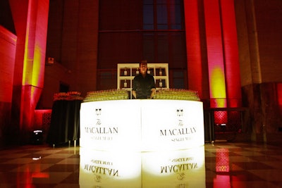 A custom illuminated bar welcomed guests into the north ballroom for the presentation and tasting.