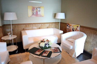 In lounge areas at the Sky Lodge, flower arrangements subtly incorporated hues from Tide packaging and coffee-table books showcased stills from the documentary. The film highlighted Tide's efforts to assist children in Haiti after the 2010 earthquake.