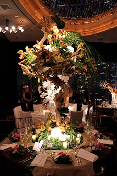 Lexington Gardens' table had a whimsical forest look with a massive nest decorated with ostrich eggs, feathers, and a bird made out of greenery.