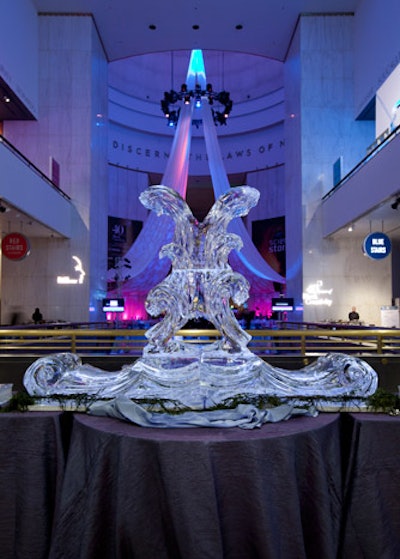 An ice sculpture from Nadeau's decorated a table piled with chilled seafood and oyster shooters.