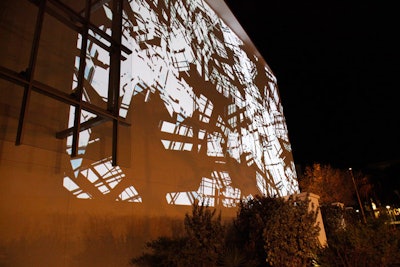 A video mural by artists Tal Rosner and C.E.B. Reas illuminated the building's exterior projection wall.
