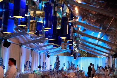 Guests dined under a ceiling of custom pendant chandeliers on the Mary and Howard Frank Plaza.