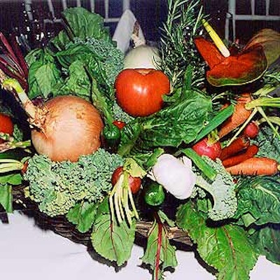 Lenox Hill Florist created edible centerpieces--baskets stuffed with fresh vegetables and herbs.