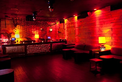 The Aspen Room has lounge seating and teak-lined walls, evoking the feeling of a ski lodge.