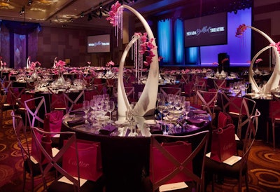 Table centerpieces were evocative of the legs of ballet dancers and included purple orchids and faux jewels in a nod to one of the signature colors in Presley's jewelry line.
