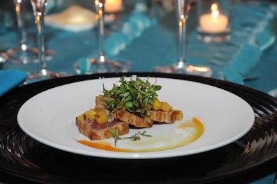 Restaurant Associates served seared tuna ceviche with grilled pineapple, serrano chili, chili oil, and cumin vinaigrette dressing for the first course.