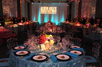 Frost Lighting projected matching gobos of the event's name on the white drape in the atrium and behind the stage of the main room.