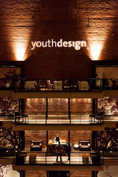 The post-event party, dubbed the 'AFTA party,' took place in the fourth-floor rotunda and included Youth Design branding illuminated on the brick wall.
