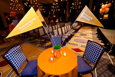 Youth Design's signature orange branding showed up on everything from table linens to pennants.