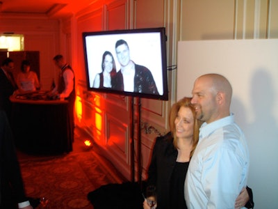 Guests took pictures in a Patrón-sponsored photo area. The images were projected on screens during the party.