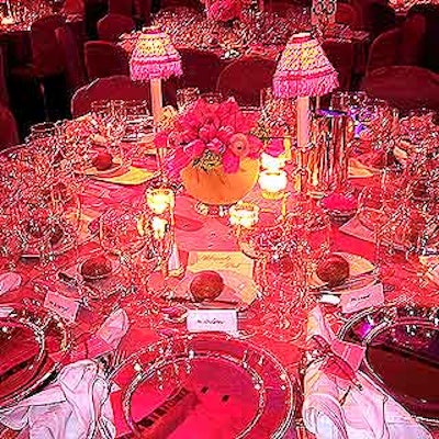 Decor by Monroe Alechman and Brian Avon of Aveda and Geoff Howell of Geoff Howell Studios included small lamps with fringed pink lampshades and centerpieces with tulips and carnations.