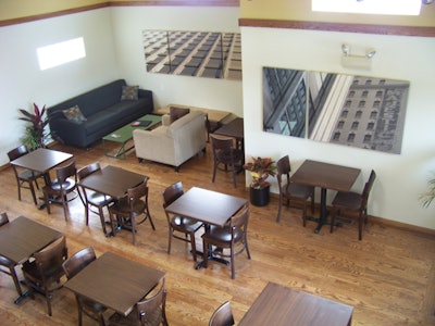 The upstairs lounge showcases photography by architect Janet Olson.