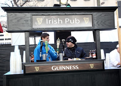 At the NetJets and Marquis Jets' event, sponsor Guinness got a bar with an Irish-pub-inspired look.