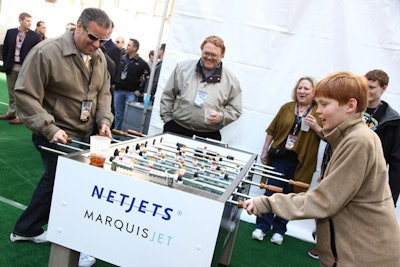 Produced by Relevant, a temporary venue called 'the Lot' took over the Joule Hotel in Dallas and hosted events for a variety of brands. At NetJets and Marquis Jets' event for 300 top clients, athletes, and celebrities, guests played foosball at a branded table.