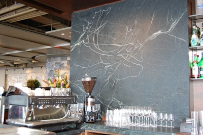 Caribous etched in soapstone flank the new bar.