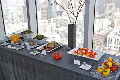 Floor-to-ceiling windows provide dramatic L.A. views.