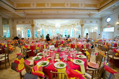 Atlas Party Rental decorated the 30 luncheon tables with bengaline fabric in raspberry and lemon.