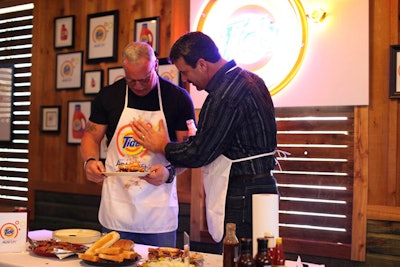 BMF Media produced a Tide luncheon at Randy White's Hall of Fame BBQ in Frisco, Texas, on Thursday. Serving up sauce-smothered sandwiches, the event promoted the stain-lifting properties of Tide With Acti-Lift.