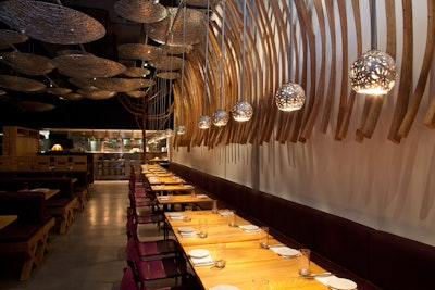 The mangrove wall is the focal point of the dining room.