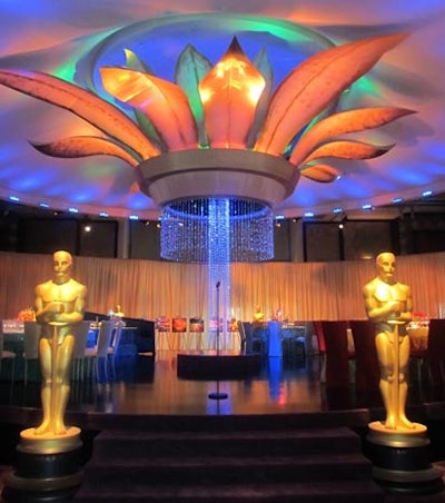 A towering palm decor piece will have a Swarovski trunk.