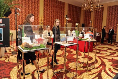 Instead of a live auction, guests browsed displays highlighting big-ticket items in the 'almost live' auction.