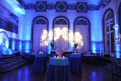 Feats Inc. used blue lighting to play off the blue and white tiles in one room of the venue.