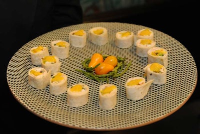 Occasions Caterers served passed hors d'oeuvres, including heirloom tomatoes wrapped in tortillas like sushi rolls.