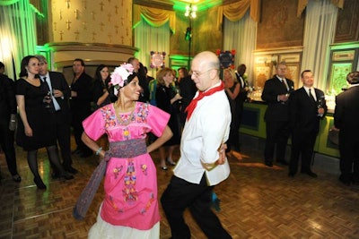 Greeters dressed in traditional Mexican clothes welcomed guests and later took a spin on the dance floor.