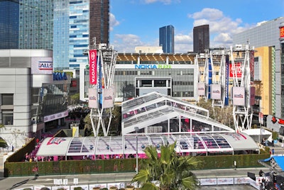 The N.B.A. All-Star Game activity sprawled over L.A. Live with an arrivals show that took over three tents.